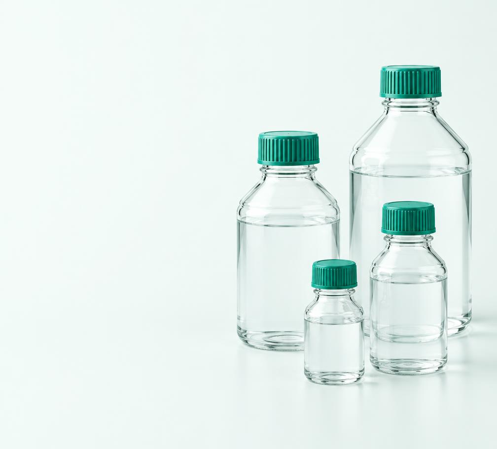 Frascos de materiais laboratoriais com tampas verdes